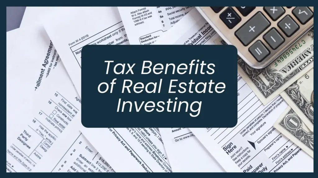 Tax documents in the background with text overlay Tax Benefits of Real Estate Investing